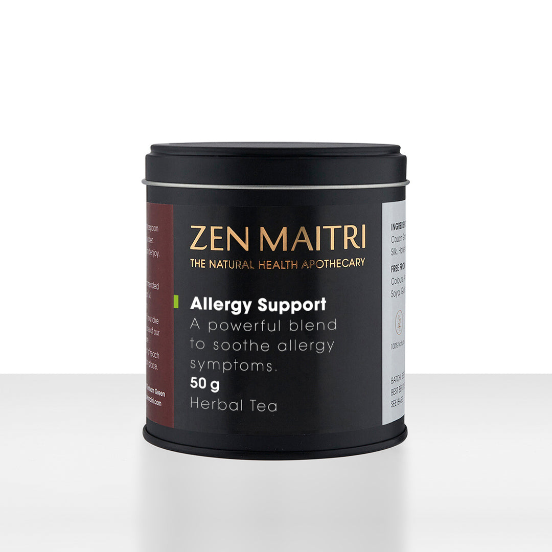 A black cylindrical tin of Zen Maitri Allergy Support Herbal Tea, 50g, on a clean white background with a soft reflection.